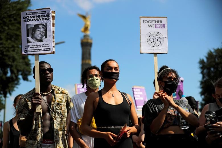 People take part in a Black Lives Matter demonstration in Berlin, Germany. REUTERS/Hannibal Hanschke